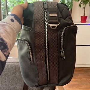 Tumi sling bag. Unisex. Like New!